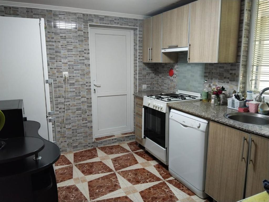Kuchyň nebo kuchyňský kout v ubytování Villa Vanila