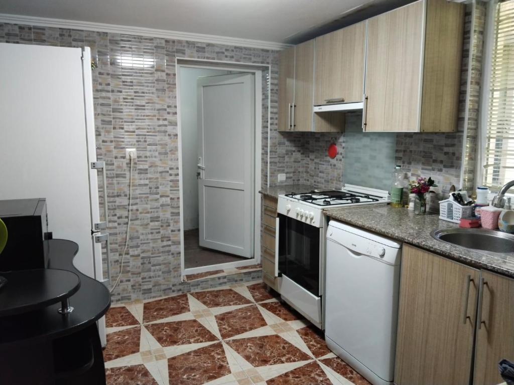 Kuchyň nebo kuchyňský kout v ubytování Villa Vanila