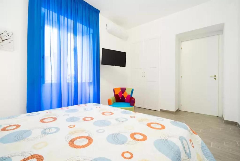 Posteľ alebo postele v izbe v ubytovaní Talia Ortigia Apartment