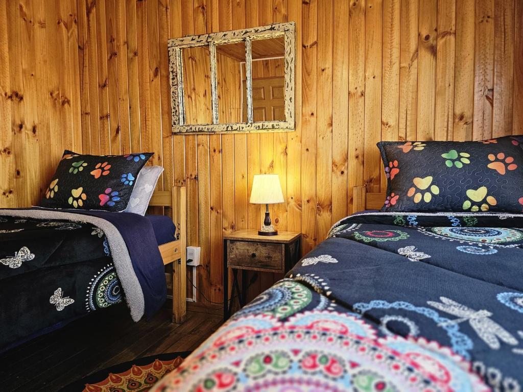 Postel nebo postele na pokoji v ubytování Hostal Sol y Luna