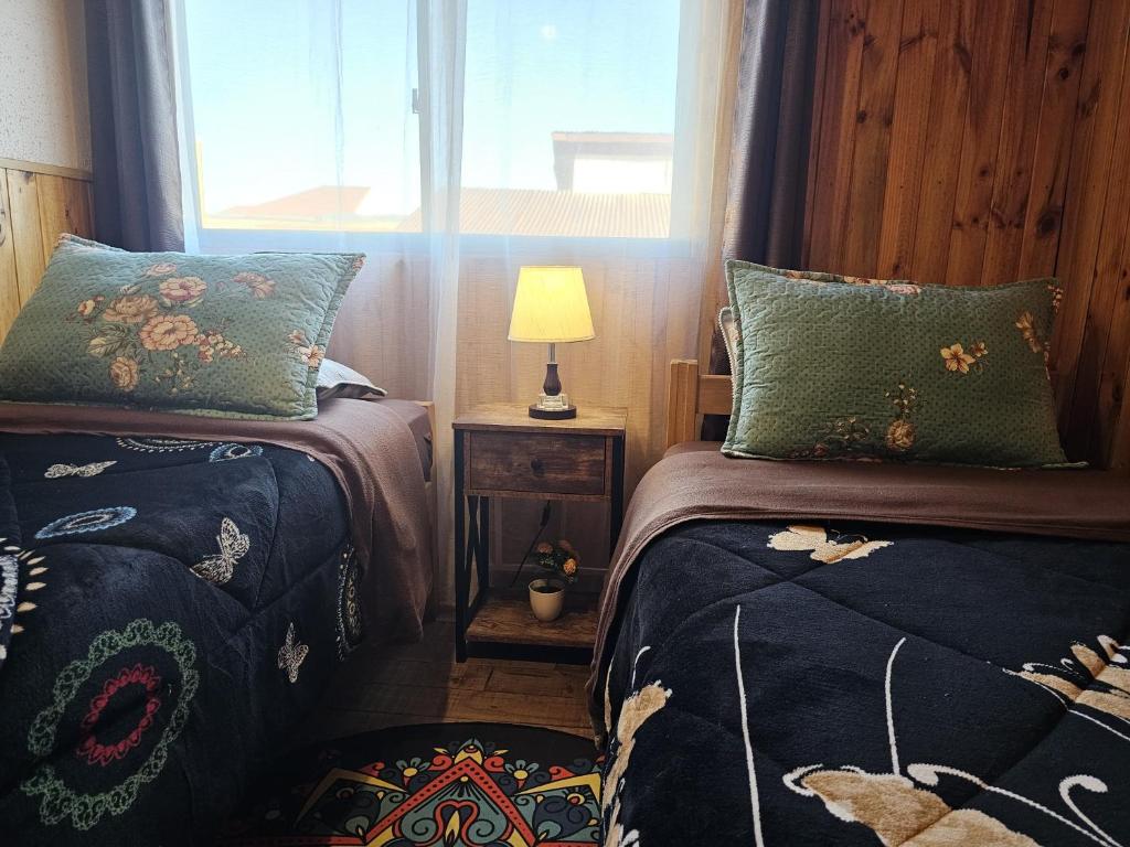 Postel nebo postele na pokoji v ubytování Hostal Sol y Luna