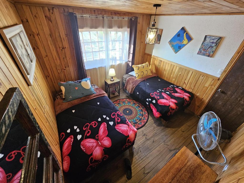 Postel nebo postele na pokoji v ubytování Hostal Sol y Luna
