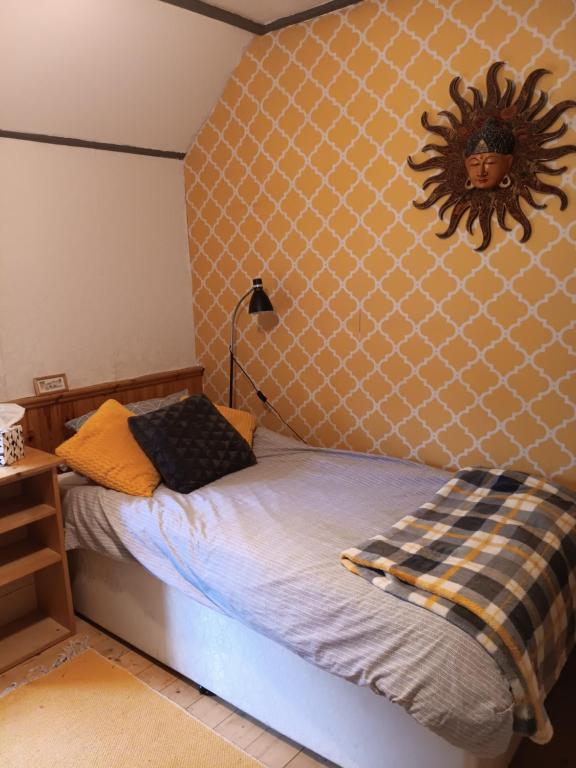 Postel nebo postele na pokoji v ubytování Aisling Cottage
