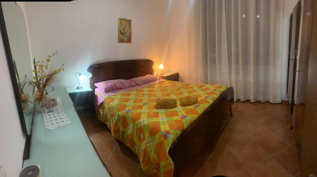 Posteľ alebo postele v izbe v ubytovaní Casa vacanza montecapino
