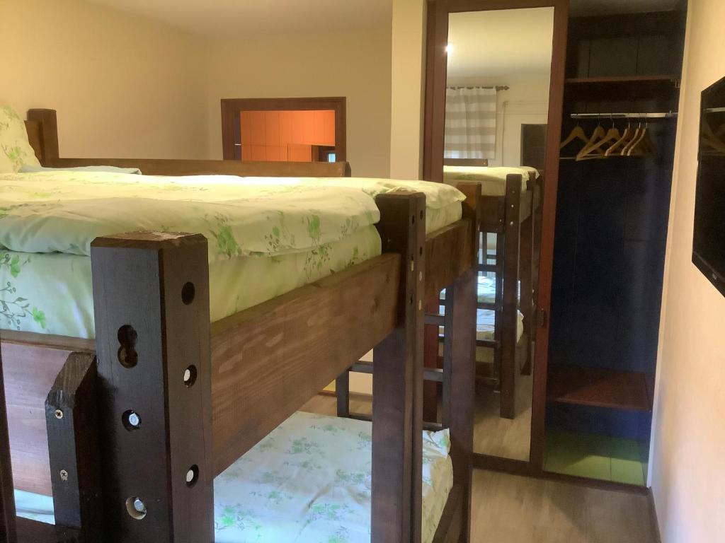 Postel nebo postele na pokoji v ubytování Garden Inn