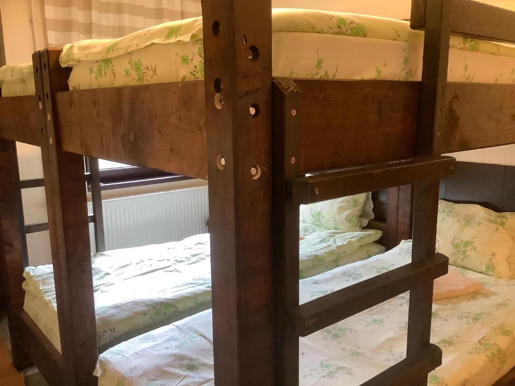 Postel nebo postele na pokoji v ubytování Garden Inn