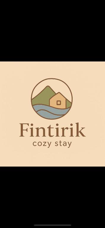 a logo for a carpentry company with a house in the middle at Fintirik Cozy Stay in Stavros