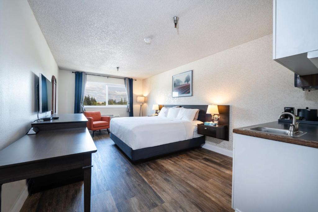Postel nebo postele na pokoji v ubytování Hotel International