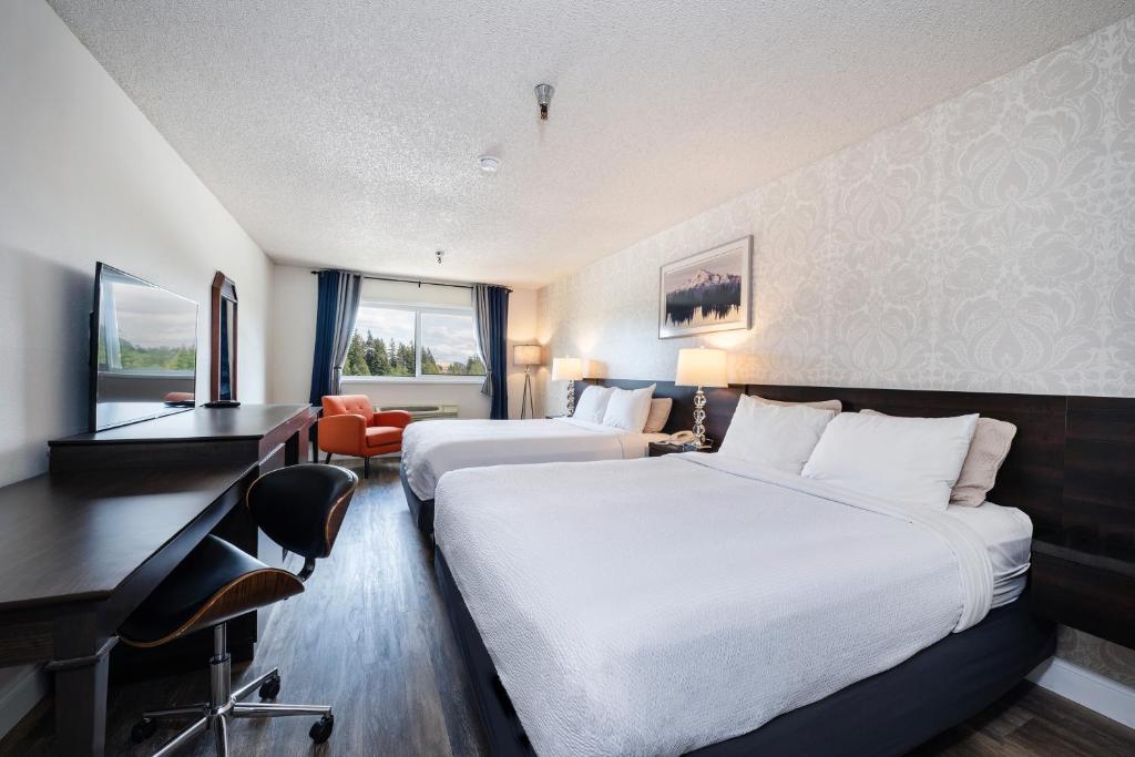 Postel nebo postele na pokoji v ubytování Hotel International