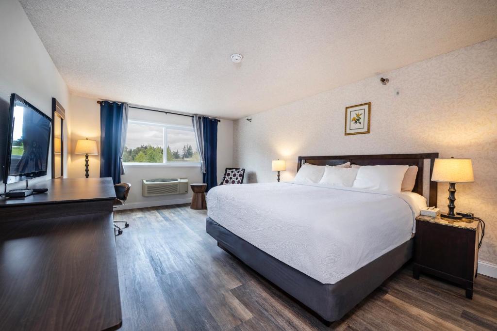 Postel nebo postele na pokoji v ubytování Hotel International