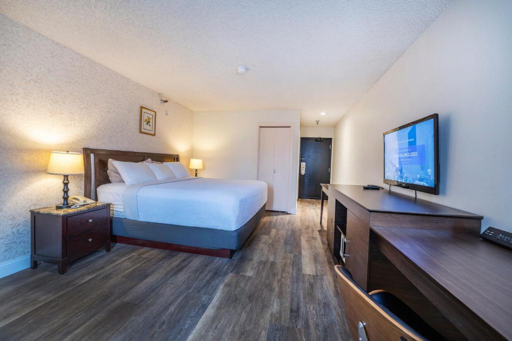 Postel nebo postele na pokoji v ubytování Hotel International