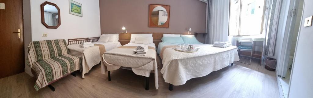 Posteľ alebo postele v izbe v ubytovaní B&B Vaticanrooms