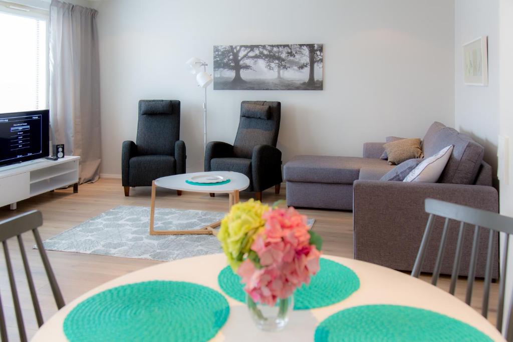 TV a/nebo společenská místnost v ubytování Apartments Rovakatu C19