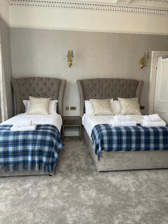 Postel nebo postele na pokoji v ubytování Kingston Guesthouse