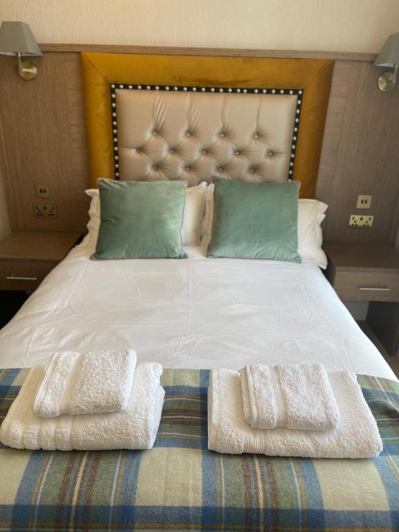 Postel nebo postele na pokoji v ubytování Kingston Guesthouse