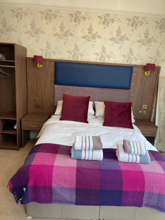Postel nebo postele na pokoji v ubytování Kingston Guesthouse