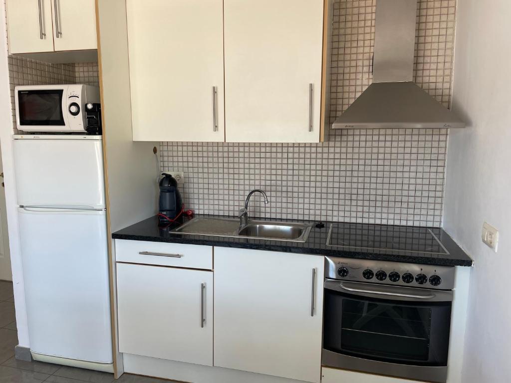 Kuchyňa alebo kuchynka v ubytovaní Platja del Port