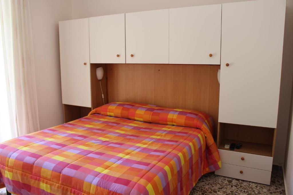 Postel nebo postele na pokoji v ubytování Nonno Gino