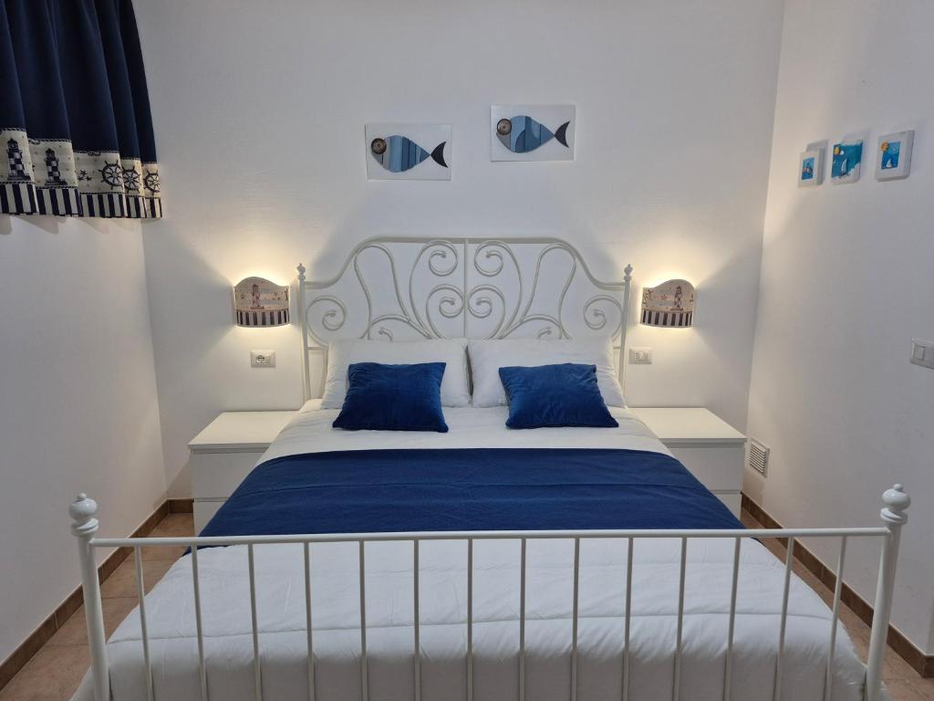 Ένα ή περισσότερα κρεβάτια σε δωμάτιο στο Torre dell'Alto apartment