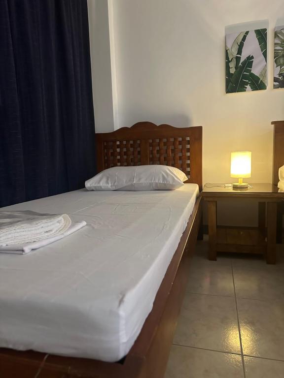 Postel nebo postele na pokoji v ubytování JORA Studio Apartment 1-B