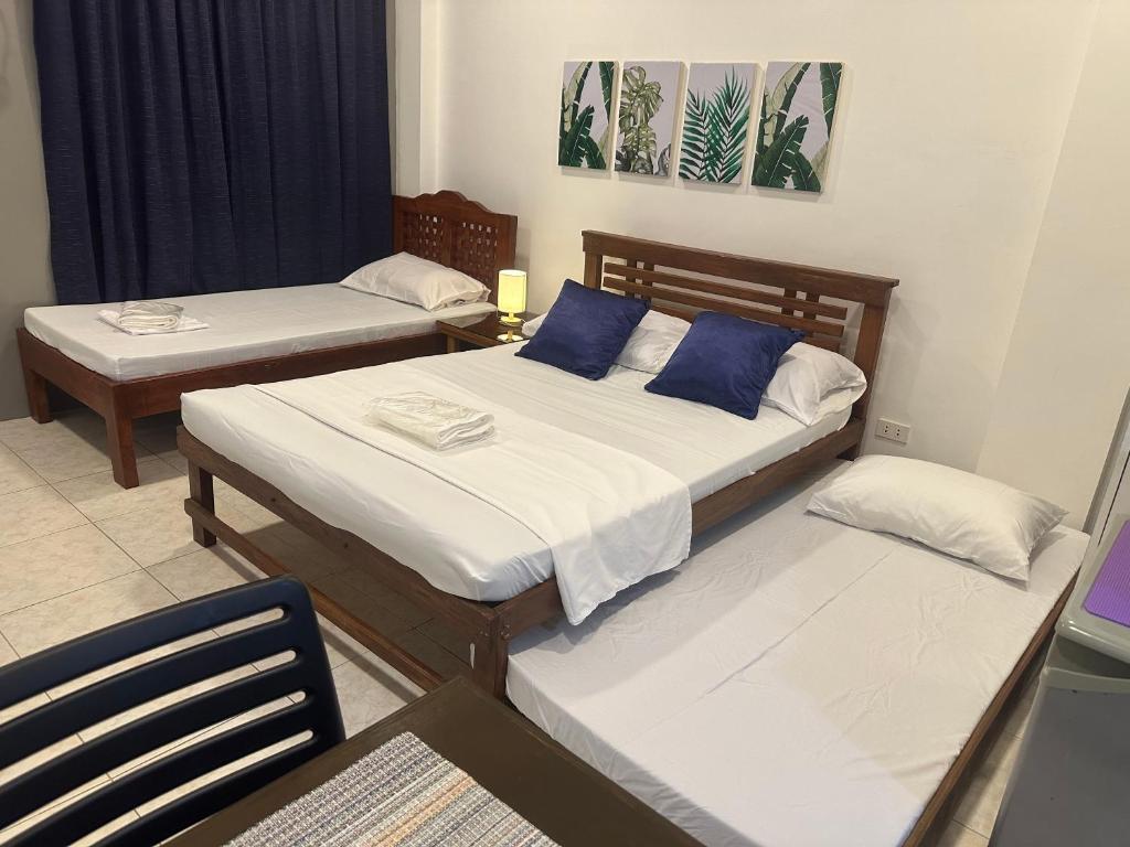 Postel nebo postele na pokoji v ubytování JORA Studio Apartment 1-C
