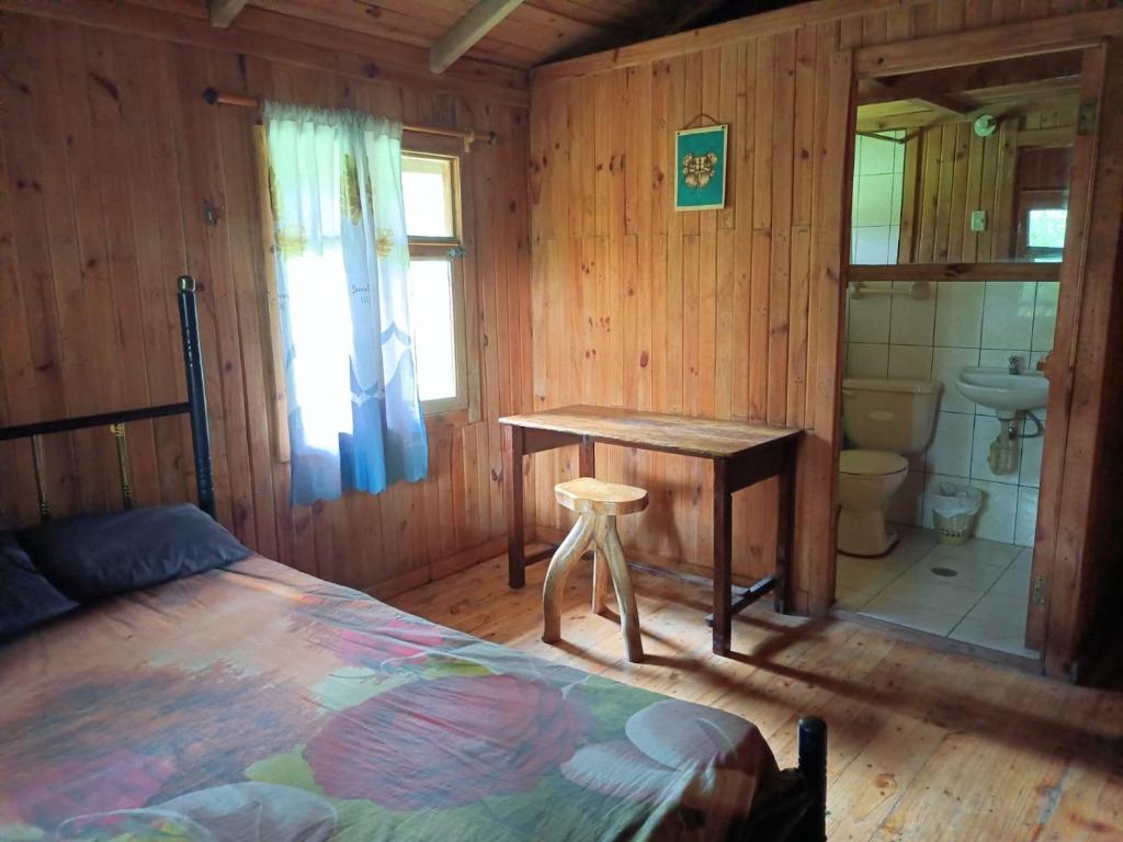 Giường trong phòng chung tại Casa Cucuya