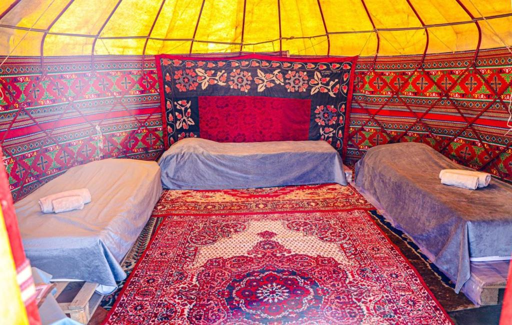 Postel nebo postele na pokoji v ubytování "Ak-Bulun" Yurt camp