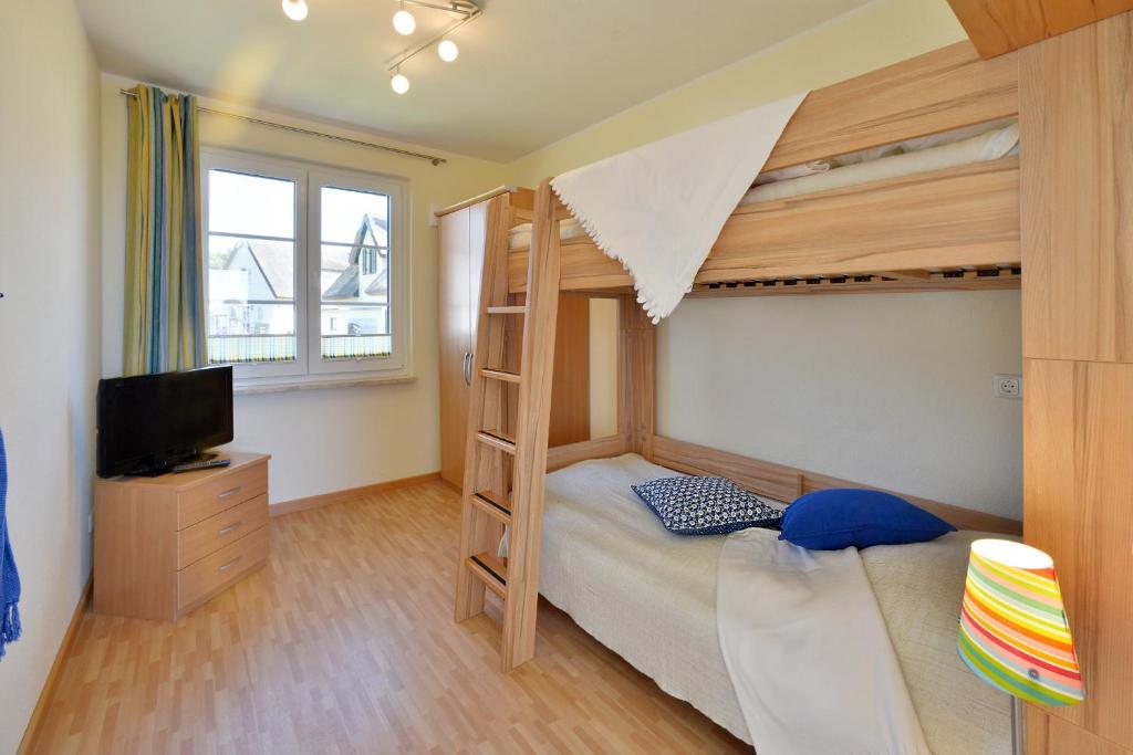 Postel nebo postele na pokoji v ubytování Ferienwohnung "Ostseebrise"
