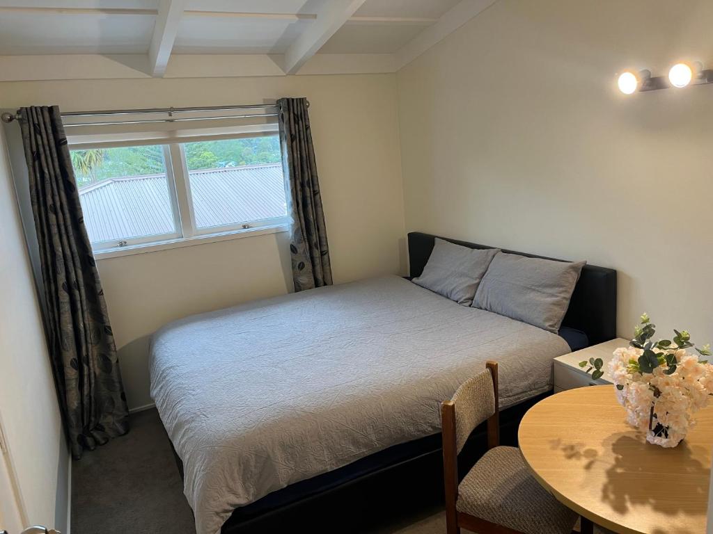 Postel nebo postele na pokoji v ubytování Hillcrest Homestay