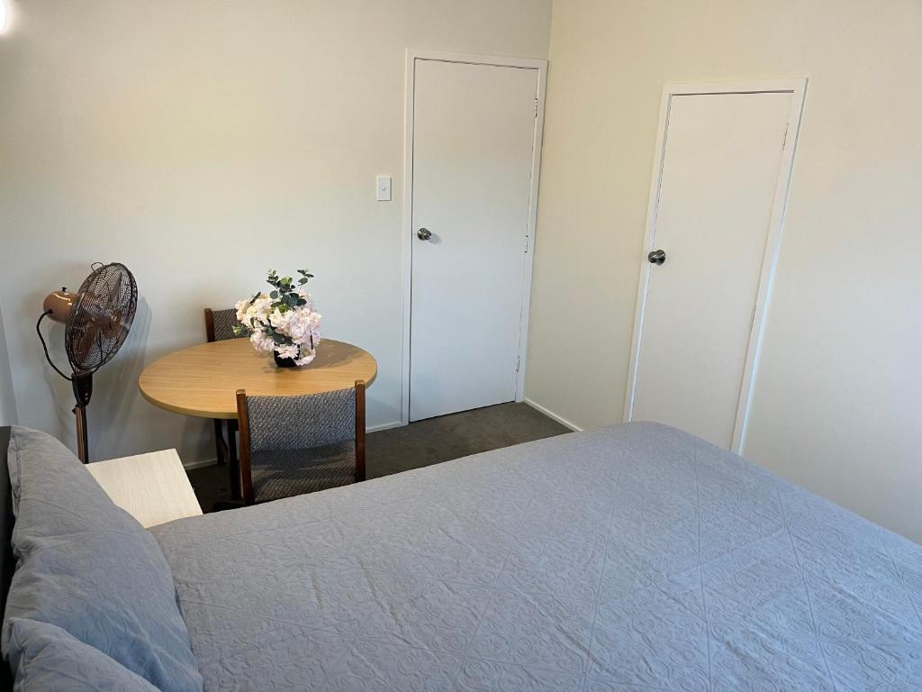 Postel nebo postele na pokoji v ubytování Hillcrest Homestay