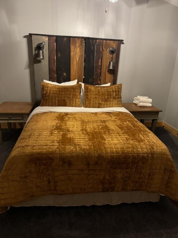Postel nebo postele na pokoji v ubytování Evergreen Escape