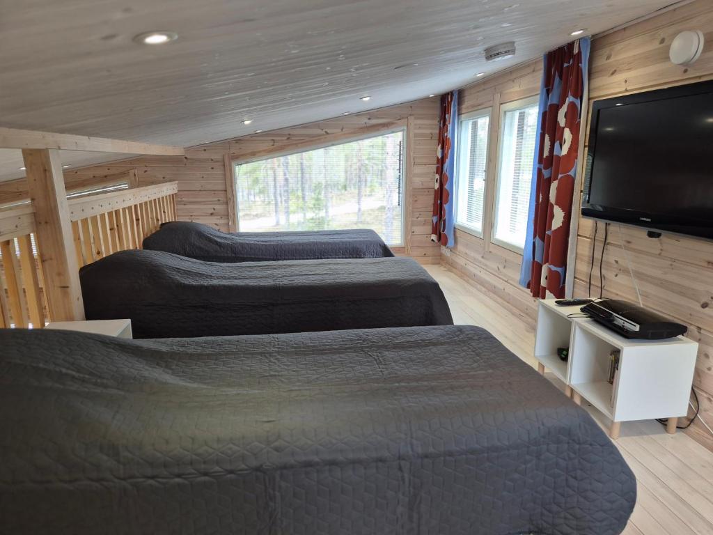 TV a/nebo společenská místnost v ubytování Holiday home Villa Esteri