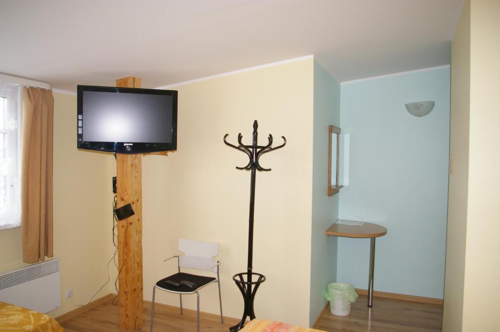 TV a/nebo společenská místnost v ubytování Kagu Hostel
