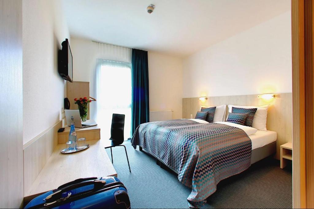Postel nebo postele na pokoji v ubytování Best sleep Hotel