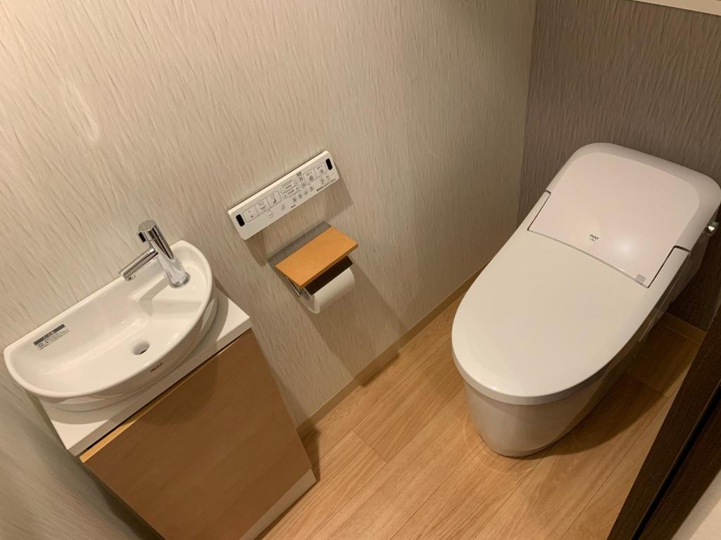 Koupelna v ubytování HOTEL BRILLIO ASAKUSABASHI