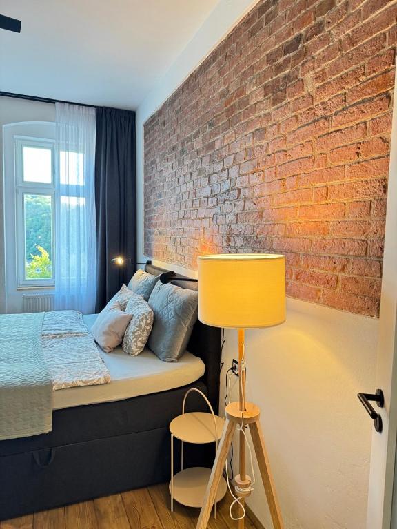 Letto o letti in una camera di FOUR ROOMS Carlsbad Authentic