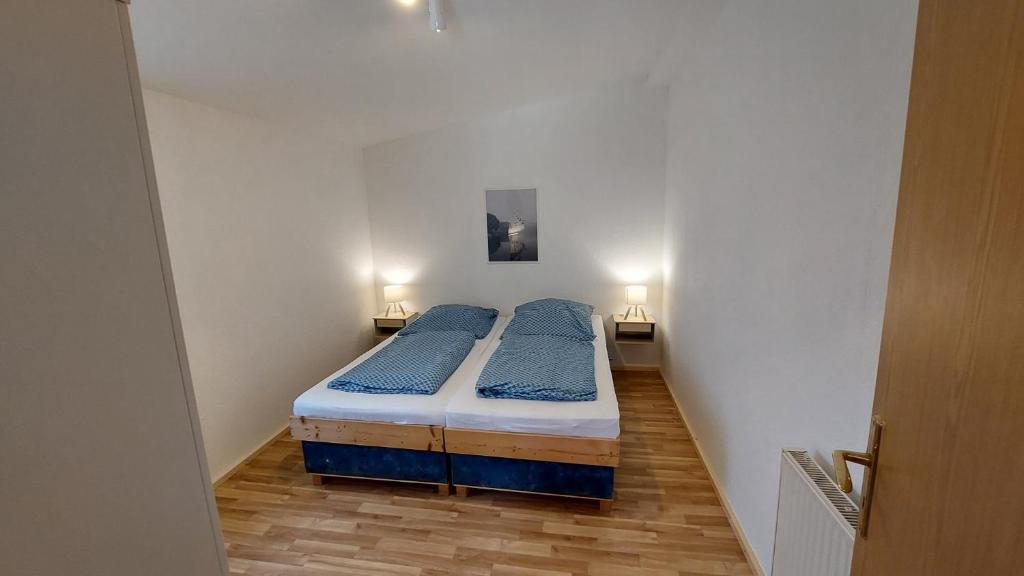 Postel nebo postele na pokoji v ubytování Bergwald