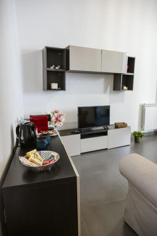 TV a/nebo společenská místnost v ubytování Casetta di Lu'