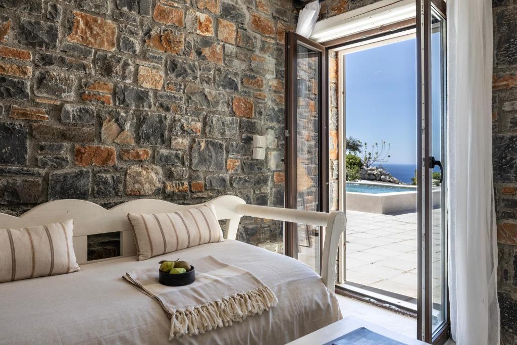 Postel nebo postele na pokoji v ubytování Palazzo Greco Villas