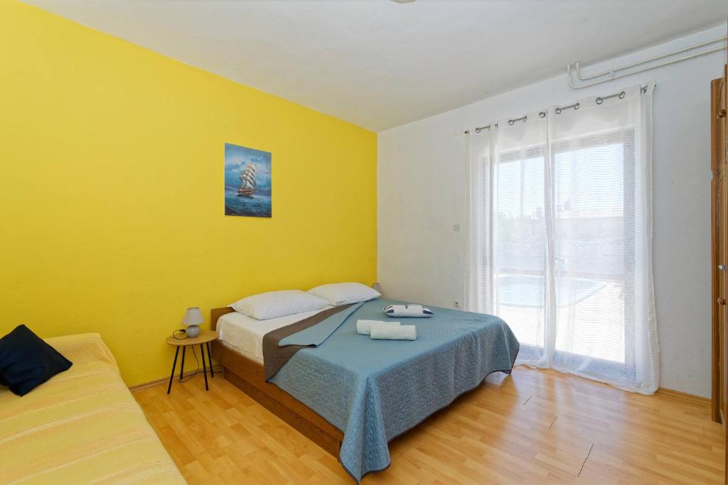 Posteľ alebo postele v izbe v ubytovaní Apartment Feruccio by Rent Istria