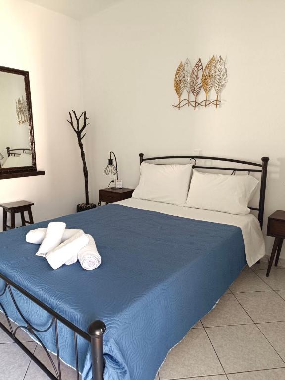 Postel nebo postele na pokoji v ubytování Xanthi Apartments