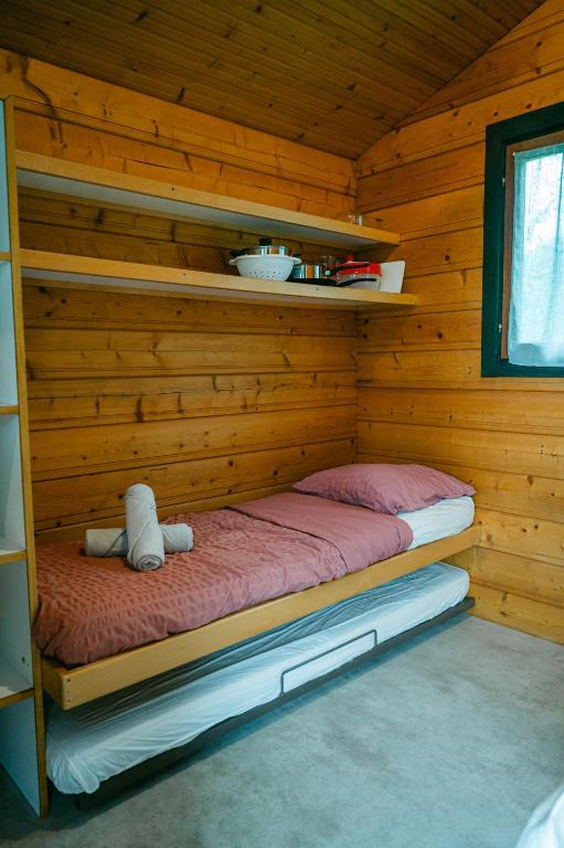 Postel nebo postele na pokoji v ubytování Camping Sérendipité