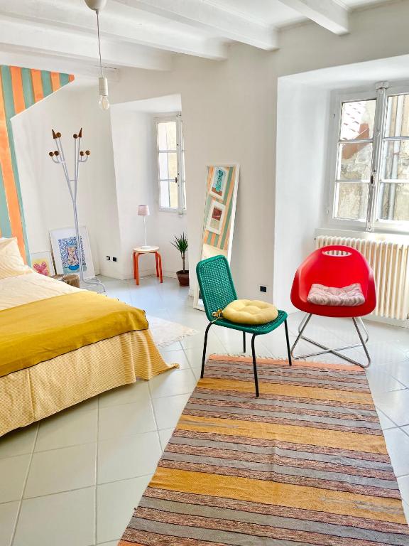 Postel nebo postele na pokoji v ubytování Casa Curiè 17 in borgo storico