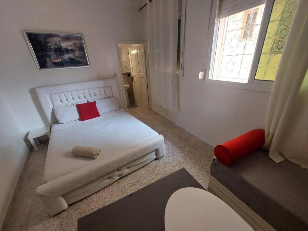 Postel nebo postele na pokoji v ubytování Hotel Maison Olga