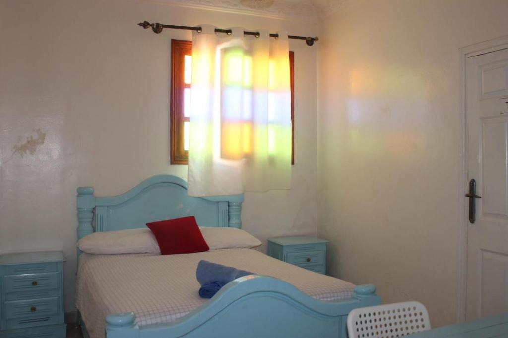 Postel nebo postele na pokoji v ubytování Hotel Maison Olga