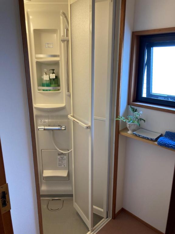 Koupelna v ubytování Guesthouse Hyakumanben Cross