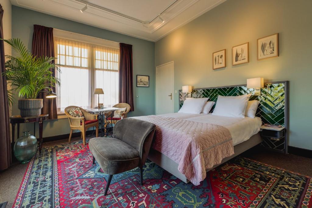 Postel nebo postele na pokoji v ubytování Villa Magnolia
