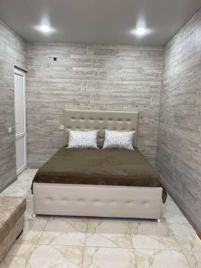 Postel nebo postele na pokoji v ubytování Hotel Kobuleti