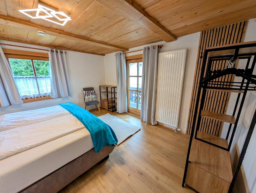 Posteľ alebo postele v izbe v ubytovaní Haus DiRol