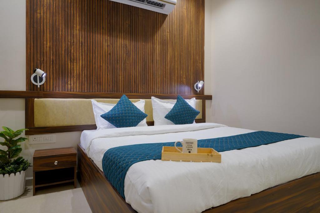Postel nebo postele na pokoji v ubytování Hotel Elite inn